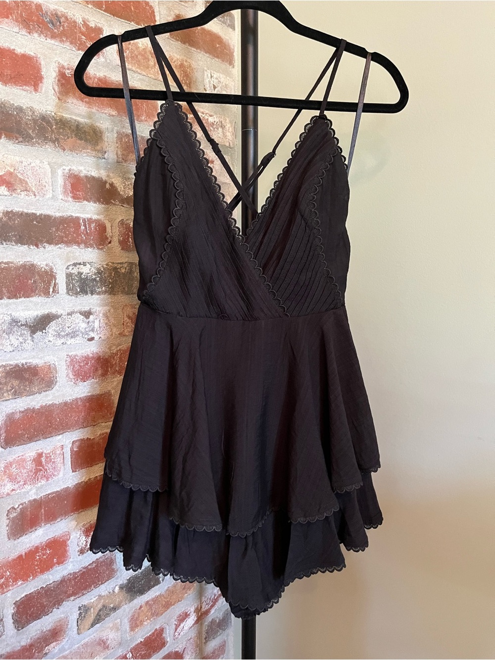 Saints + Secrets tiered black romper in black NWT | size small